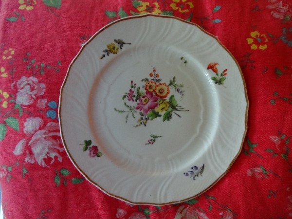 Under the biscuits, an empty plate - Coalport with hand painted flowers 